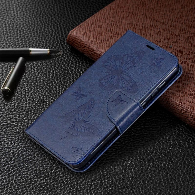 Leren Hoesje voor Samsung Galaxy A31 Donkerblauw Magenta Vlinders Tijdens De Vlucht Met String