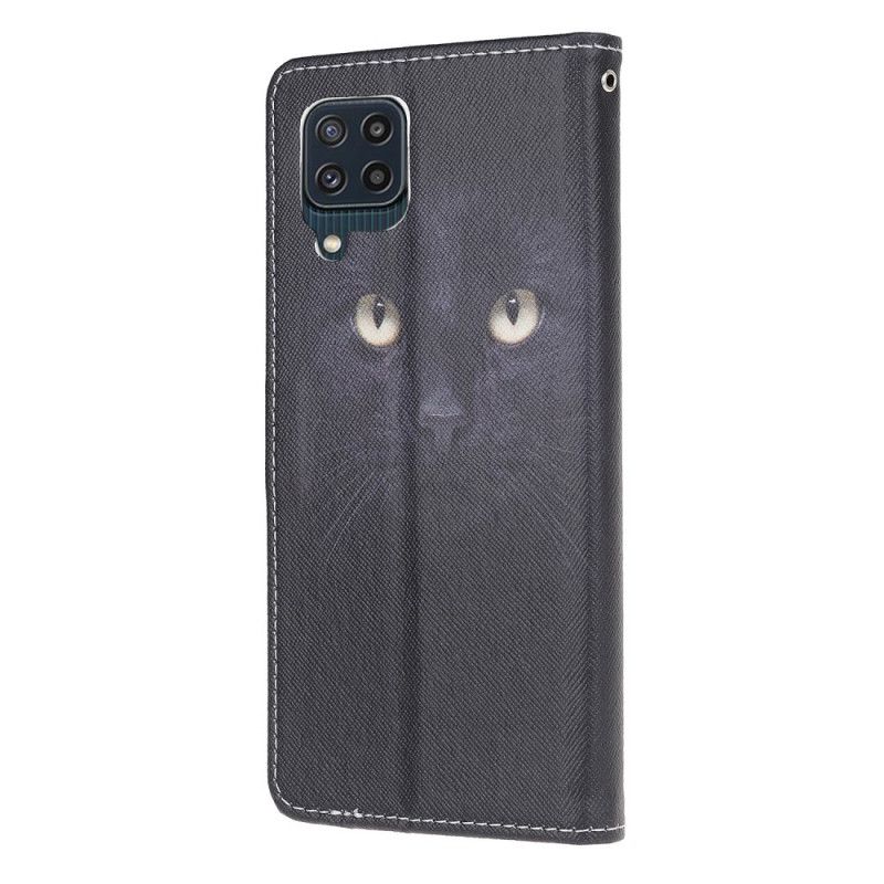 Leren Hoesje Samsung Galaxy M32 Kattenogen Met Zwarte Bandjes Bescherming Hoesje